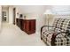 Relaxing living area with drink bar, sink, and comfortable furniture at 5030 Nightshade Ln, Noblesville, IN 46062