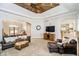 Spacious living room with an architectural ceiling, fireplace, and an open layout at 5030 Nightshade Ln, Noblesville, IN 46062