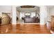 Spacious living room with a fireplace, neutral tones, and hardwood floors at 5030 Nightshade Ln, Noblesville, IN 46062