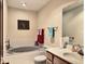 Clean bathroom with a large bathtub, double vanity, and updated fixtures at 5299 Carnoustie Cir, Avon, IN 46123