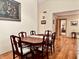 Charming dining room with hardwood floors and antique dining set at 5299 Carnoustie Cir, Avon, IN 46123
