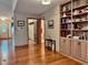 Welcoming entryway offering hardwood floors, built-in shelving, and access to other rooms at 5299 Carnoustie Cir, Avon, IN 46123