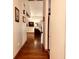 Hardwood floors in hallway leading to living room at 5299 Carnoustie Cir, Avon, IN 46123