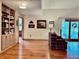 Spacious living room with hardwood floors and built-in shelving at 5299 Carnoustie Cir, Avon, IN 46123