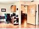 Bright office with wood floors and a view into the living room at 5299 Carnoustie Cir, Avon, IN 46123