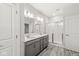 Bathroom with dual sinks and a step-in shower at 537 Steinbeck Pl, Carmel, IN 46032