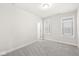 Spacious bedroom with two large windows, perfect for a comfortable and relaxing space at 537 Steinbeck Pl, Carmel, IN 46032