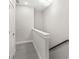 Hallway with carpet and wood railing, a perfect view from the top of the stairs at 537 Steinbeck Pl, Carmel, IN 46032