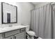 Bathroom with vanity, toilet, and shower with curtain at 6433 Wasco Dr, Whitestown, IN 46075