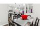 Kitchen and dining area with modern appliances and breakfast bar at 6433 Wasco Dr, Whitestown, IN 46075