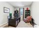 Spacious home office with built-in shelving and large window at 6433 Wasco Dr, Whitestown, IN 46075