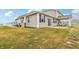 Tan house with black shutters and small patio at 6433 Wasco Dr, Whitestown, IN 46075