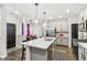 Modern kitchen with stainless steel appliances and an island at 6433 Wasco Dr, Whitestown, IN 46075