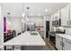 Modern kitchen with stainless steel appliances and an island at 6433 Wasco Dr, Whitestown, IN 46075