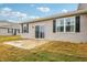 Private patio with sliding glass doors and small yard at 6433 Wasco Dr, Whitestown, IN 46075