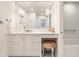 Bathroom featuring large vanity with drawers and stool and subway tile in shower at 7341 Washington Blvd, Indianapolis, IN 46240