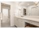Bathroom featuring large vanity, makeup area, and an additional shower area at 7341 Washington Blvd, Indianapolis, IN 46240
