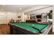 Game room featuring a pool table and open access to the living room area at 7341 Washington Blvd, Indianapolis, IN 46240