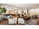 Open living room showcases a pool table, hardwood floors, and comfortable seating arrangement at 7341 Washington Blvd, Indianapolis, IN 46240