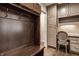 Mud room featuring built in bench with cubbies, storage, and desk area at 7341 Washington Blvd, Indianapolis, IN 46240