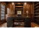 Executive office with wood paneling, built-ins, and a sophisticated desk at 7341 Washington Blvd, Indianapolis, IN 46240