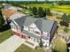 Aerial view of a two-story house with a gray roof at 10723 Pokagon Way, Indianapolis, IN 46239