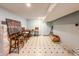 Partially finished basement room with tiled floor, ideal as a home office or den at 10723 Pokagon Way, Indianapolis, IN 46239