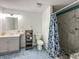 Basement bathroom with shower, toilet, and vanity at 10723 Pokagon Way, Indianapolis, IN 46239