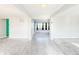 Bright entryway with grey flooring and carpet, leading to spacious living areas at 10723 Pokagon Way, Indianapolis, IN 46239