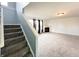 Carpeted staircase leading to the upper level of the home at 10723 Pokagon Way, Indianapolis, IN 46239