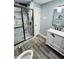Modern bathroom with gray floor and a shower at 1243 W 19Th St, Indianapolis, IN 46202