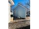 Newly painted shed with a single door, located in the backyard at 1243 W 19Th St, Indianapolis, IN 46202