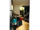 A cluttered living room with a hammock and various items at 1243 W 19Th St, Indianapolis, IN 46202
