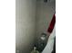 Shower stall with gray tile and a shower head at 1243 W 19Th St, Indianapolis, IN 46202