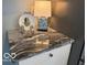 Kitchen countertop featuring granite counters and white cabinets at 2029 W 60Th St, Indianapolis, IN 46228