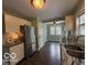 Kitchen featuring stainless steel appliances, granite counters, and hardwood floors at 2029 W 60Th St, Indianapolis, IN 46228
