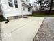 A concrete patio offers a great space for outdoor dining and entertaining at 2029 W 60Th St, Indianapolis, IN 46228