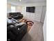 Basement features a large seating area with a big screen television at 2322 Dixon Creek Dr, Whitestown, IN 46075