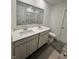Bathroom featuring a double vanity, neutral color scheme and sleek fixtures at 2322 Dixon Creek Dr, Whitestown, IN 46075