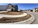 A quiet street view showcases a neighborhood with well-kept lawns and sidewalks at 2322 Dixon Creek Dr, Whitestown, IN 46075