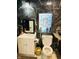 Bathroom with marble tile and white vanity at 3128 S Holt Rd, Indianapolis, IN 46221