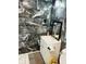 Bathroom with marble tile and white vanity at 3128 S Holt Rd, Indianapolis, IN 46221