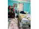 Bedroom with full bed and dresser at 3128 S Holt Rd, Indianapolis, IN 46221