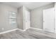 Well-lit bedroom with hardwood floors and ample closet space at 3340 N Sherman Dr, Indianapolis, IN 46218