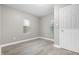 Spacious bedroom with hardwood floors and neutral walls at 3340 N Sherman Dr, Indianapolis, IN 46218