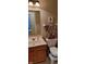 Cozy bathroom featuring a light wood vanity and a neutral color scheme at 3656 Homestead E Cir, Plainfield, IN 46168