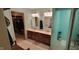 Bathroom with double vanity, updated fixtures, and separate room for glass shower at 3656 Homestead E Cir, Plainfield, IN 46168
