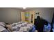 A cozy bedroom with blue walls, a comfortable bed and nearby hallway view at 3656 Homestead E Cir, Plainfield, IN 46168