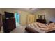 Bright bedroom showcasing a vaulted ceiling, ensuite bathroom, and walk in closet at 3656 Homestead E Cir, Plainfield, IN 46168