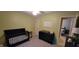 Bedroom including a crib and changing table, painted in soothing green tones at 3656 Homestead E Cir, Plainfield, IN 46168